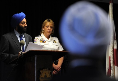 "EWEL SAMAD/AFP/GETTY IMAGES - Metropolitan Police Chief Cathy Lanier listens as Jasjit Singh, Executive Director, Sikh American Legal Defense and Education Fund, speaks during an event to release the department’s new uniform and appearance rules May 16 at MPD headquarters in Washington." (source: Washington Post)
