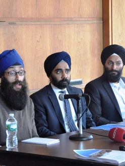 Prabhjot Singh (left) speaks at a press conference with Amardeep Singh (middle) of the Sikh Coalition and Jasjit Singh (right) of SALDEF on September 23, 2013. (Source: The Sikh Coalition)